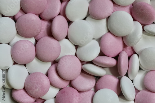 white and pink chocolate mints as background