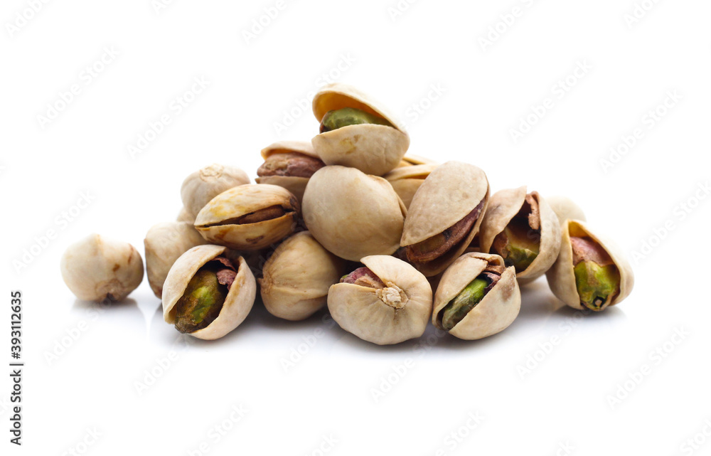 Pistachio nuts. Isolated on a white background Pistachio nuts. Isolated on a white background