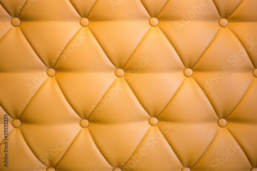 Luxurious leather background in gold color