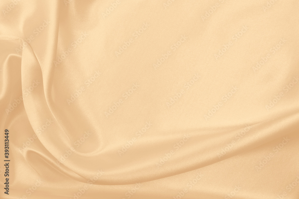 Smooth elegant golden silk or satin luxury cloth texture as wedding background. Luxurious background design. In Sepia toned. Retro style Smooth elegant golden silk or satin luxury cloth texture as wedding background. Luxurious background design. In Sepia toned. Retro style