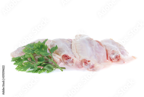 Raw chicken  on cutting board on white background