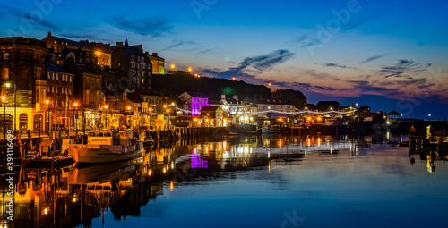 Whitby Harbour at night with sunset sky taken at Whitby, Yorkshire, UK on 21 May 2018 © Nigel