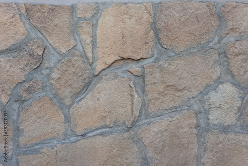 abstract texture of old stone wall of street house © Алексей Доненко