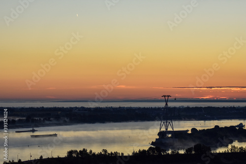 dawn over the cable car across the river © Igor