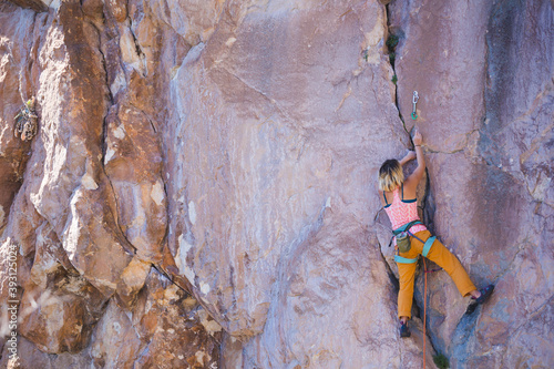 Overcoming the fear of heights, a girl trains on Turkish rocks