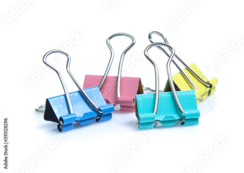 Colorful binder clip isolated on white background