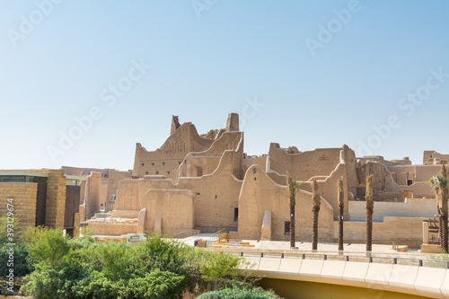 Palm trees and Ruins of Diraiyah, also as Dereyeh and Dariyya, a town in Riyadh, Saudi Arabia, was the original home of the Saudi royal family, and served as the capital of the Emirate of Diriyah. photo