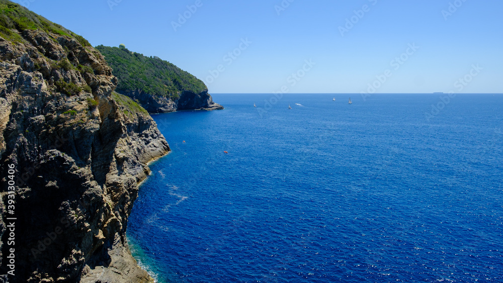 Coastline on the French riviera with the infinite blue horizon of the sea