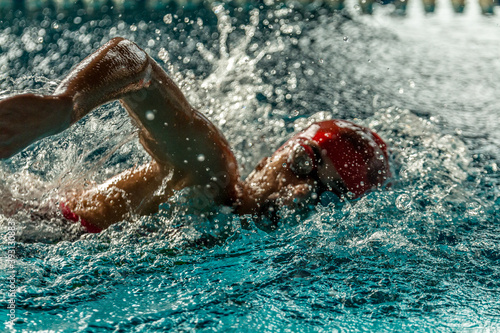 Swimmer at the pool swimming freestyle © WildGlass Photograph