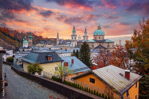Salzburg, Austria. Cityscape image of the Salzburg, Austria with Salzburg Cathedral at beautiful autumn sunset.