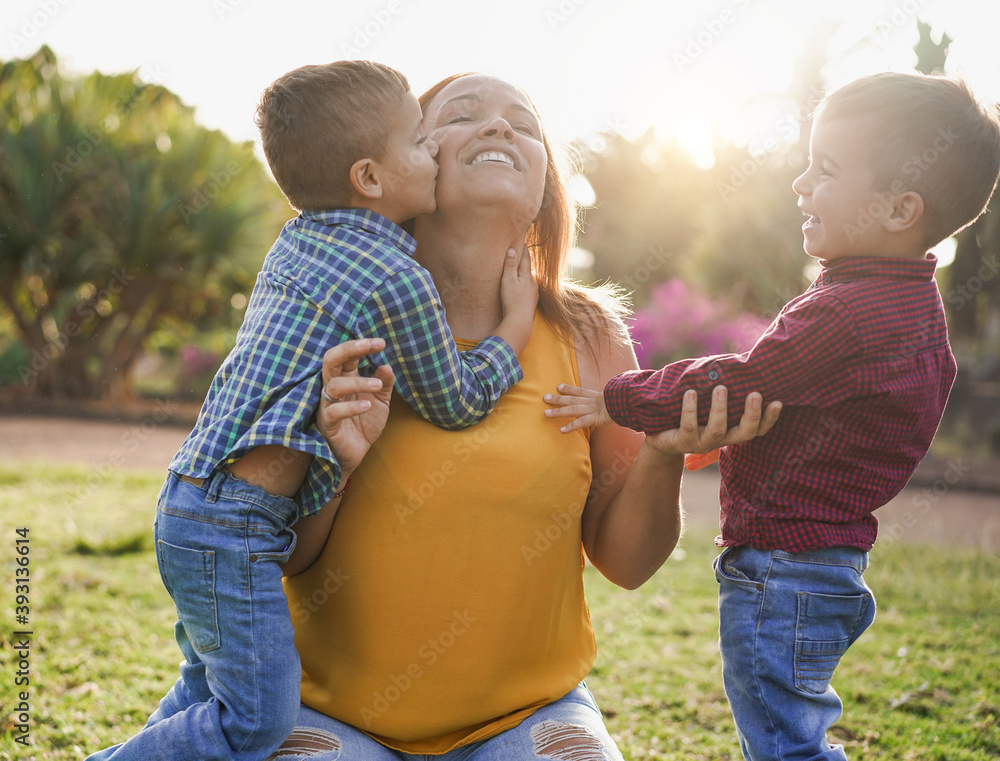 Foto De Happy Single Mother With Twin Sons In Nature Park Family Day 