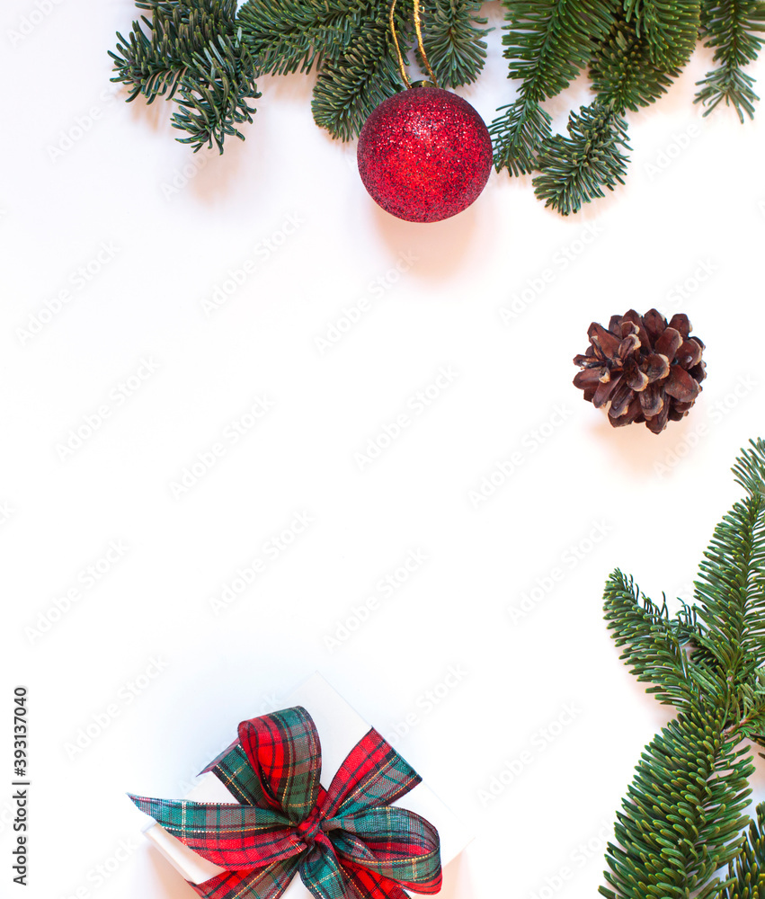 Christmas and New Year concept frame with winter holiday decorations on the white background. Top view festive greeting card. Copy space