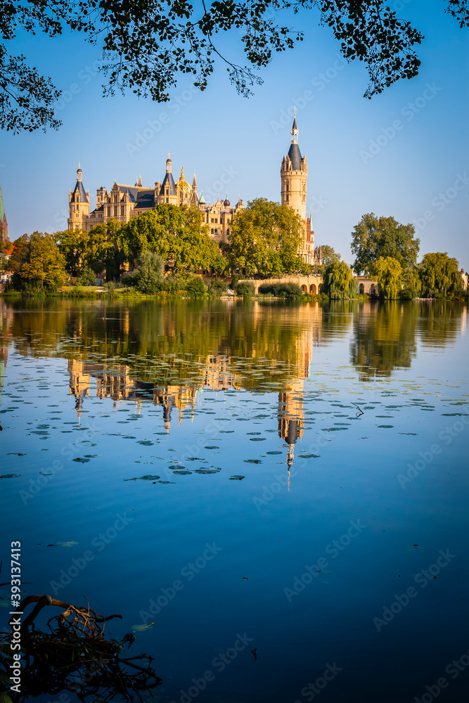 Schwerin Castle is reflected in the water