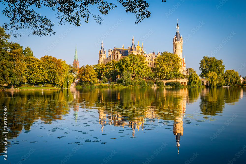 Schwerin Castle is reflected in the water