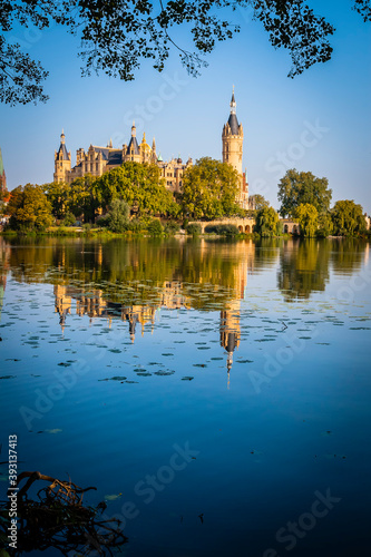 Schwerin Castle is reflected in the water