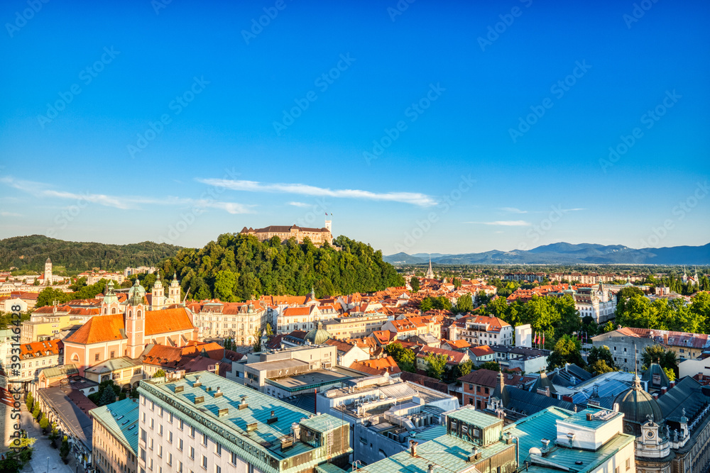 Ljubljana City Center Aerial View with Ljubljana Castle in the Background during a Sunny Day