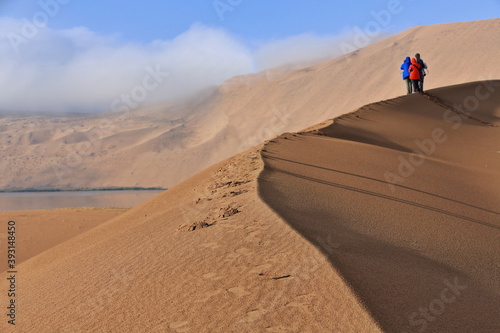 Tourists on a sand dune ridge. Badain Jaran Desert-Inner Mongolia-China-1130