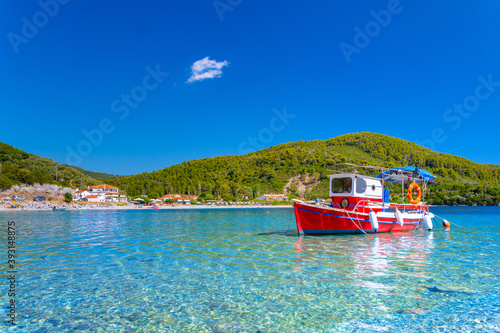 Fototapeta Naklejka Na Ścianę i Meble -  Amazing beach of Panormos, Skopelos with traditional fishing boats, Greece