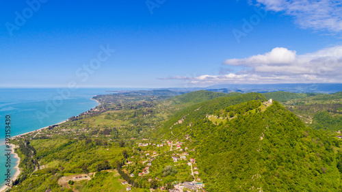 View from drone on Black sea coastal town New Athos and Anakopia mountain