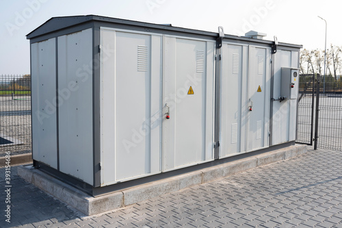Transformer on the street. Transformer substation in a closed area, voltage, electricity