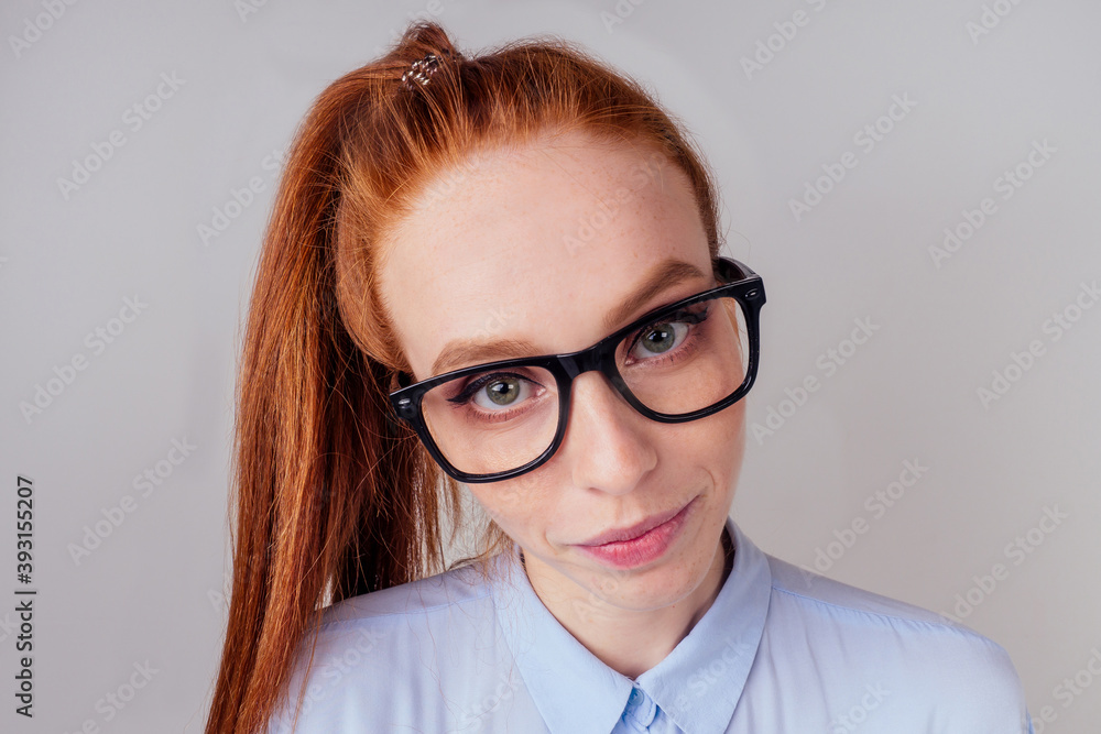 redhair ginger woman wearing glass in studio background fish eye redhair ginger woman wearing glass in studio background fish eye