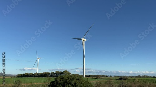 wind turbine with beautiful blue sky photo