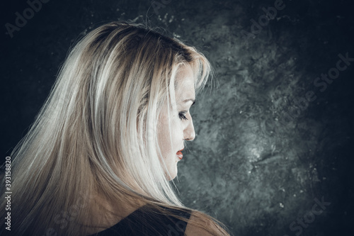 Attractive plump woman studio portrait close up view. photo