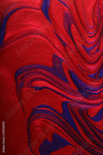 Vertical red and blue shimmer abstract background. Make up concept.Beautiful stains of liquid nail laquers.Fluid art,pour painting technique.Horizontal banner,can be used as backdrop for chat.