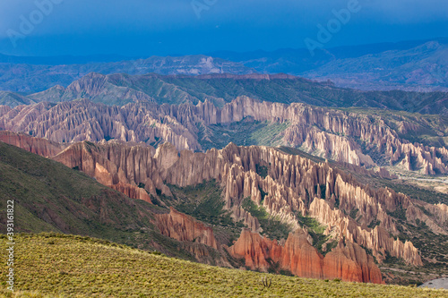 High angle view of eroded badlands during sunset