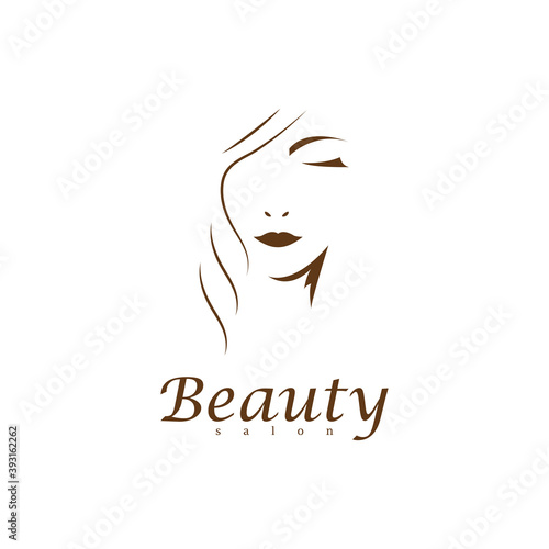 Beauty saloon logo. Woman face and hair logo vector. Beautiful woman vector logo template for hair or beauty salon, cosmetic procedures, spa center.