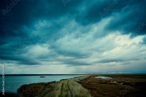 View of stormy clouds over duck hunting field in Montana photo