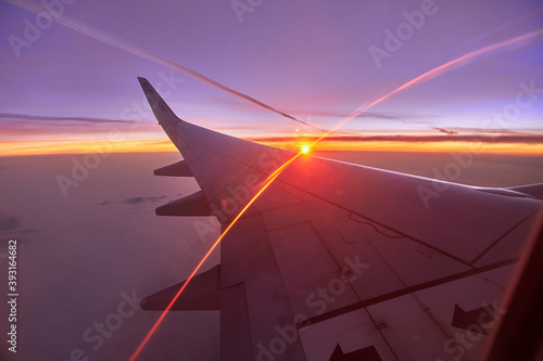 Colorful sunrise seen from an airplane
