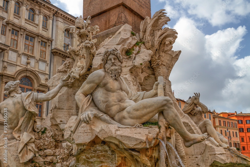 Close upon fountain of the Four Rivers, Fontana dei Quattro Fiumi, by day in Piazza Navona, Rome, Italy