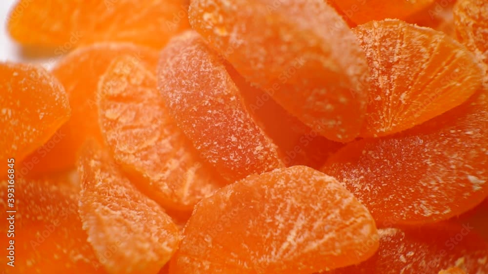 bright pieces of delicious marmalade in the form of orange slices. bright pieces of delicious marmalade in the form of orange slices.