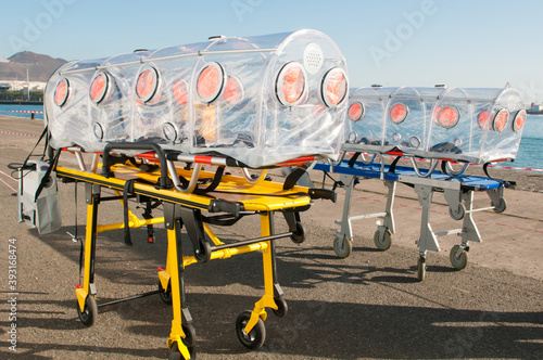 ambulance bed preparing for ebola, covid or virus pandemic  photo