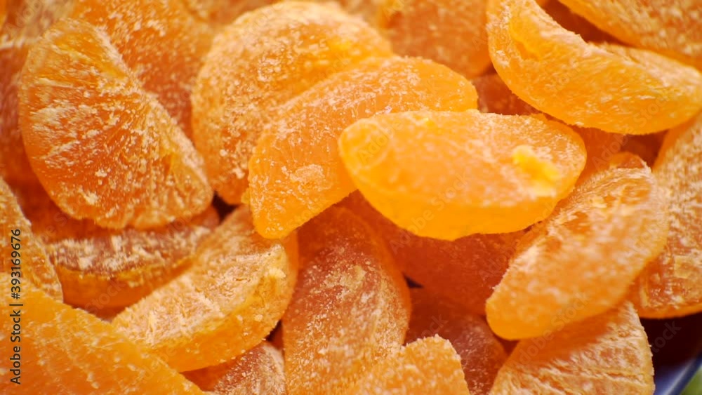 bright pieces of delicious marmalade in the form of orange slices. bright pieces of delicious marmalade in the form of orange slices.