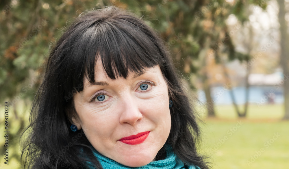 close up portrait of beautiful forty five year old woman outdoors close up portrait of beautiful forty five year old woman outdoors