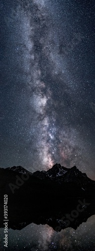 Milky way and stars over McGown Peak, Sawtooth mountains reflecting in Stanley Lake, ID. 