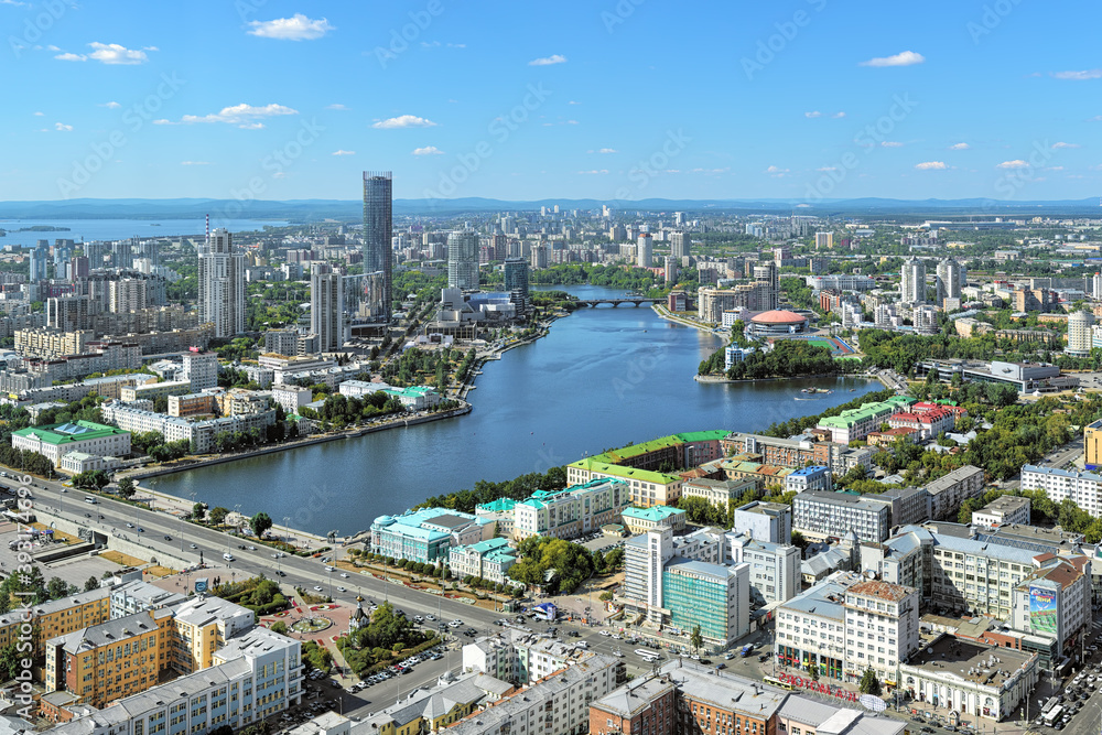 Yekaterinburg, Russia. View of the city pond, historical center and Yekaterinburg-City district from observation deck on Vysotsky skyscraper. The observation deck is located at 186m above the ground.