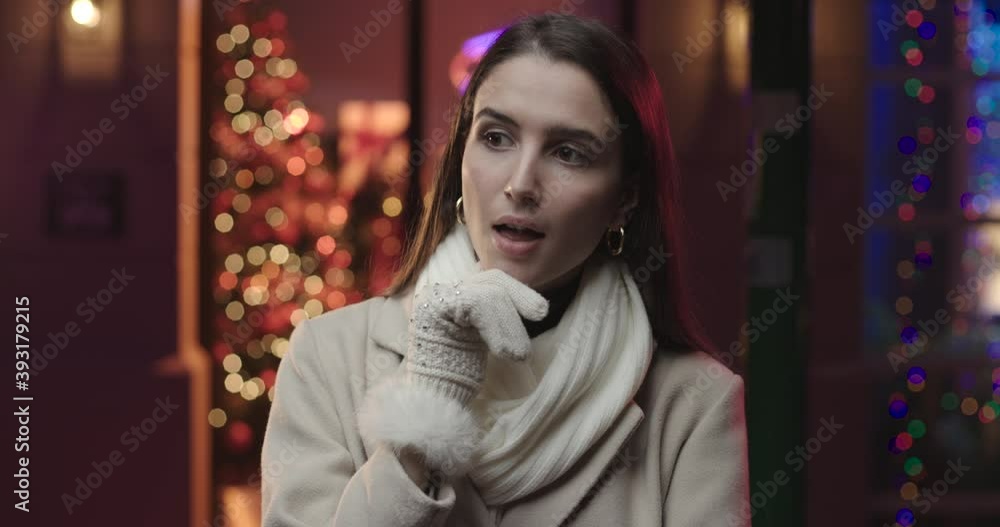 Yong woman looking thoughtful.