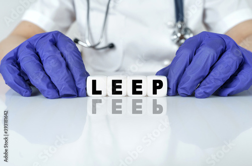 The doctor put together a word from cubes LEEP photo