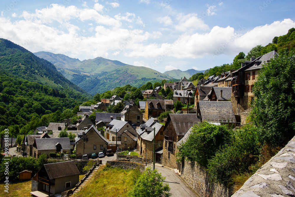 Small village in the French Pyrenees with mountains in the background. High quality photo Small village in the French Pyrenees with mountains in the background. High quality photo