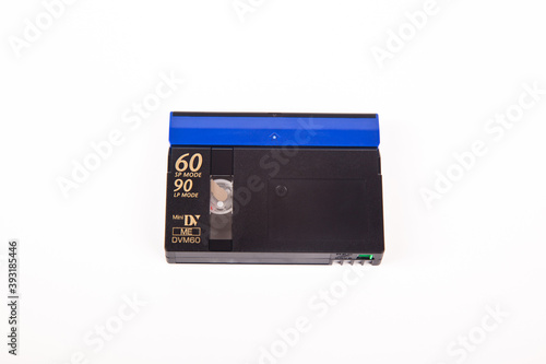 Small old MiniDV format video cassette, isolated on white background