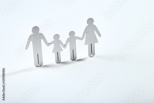 Family figures on grey background