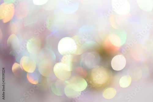 Abstract blurred bright beautiful glitter background. Pastel and gentle colors. Bright and colorful background.