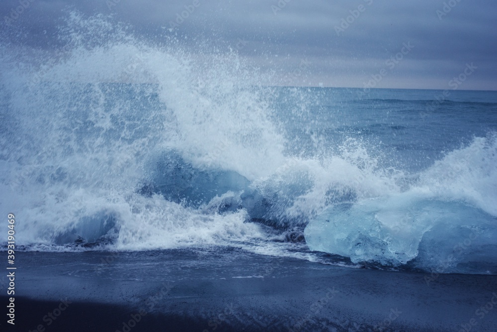 Fototapeta premium Diamond Beach, a Black sand and ice rocks beach, Jokulsarlon, Iceland