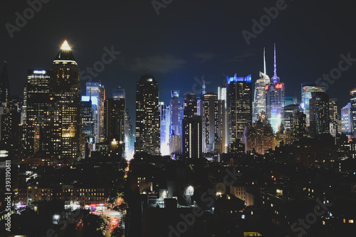 New York, NY, USA - June 29, 2019: Night Manhattan view from The Press Lounge