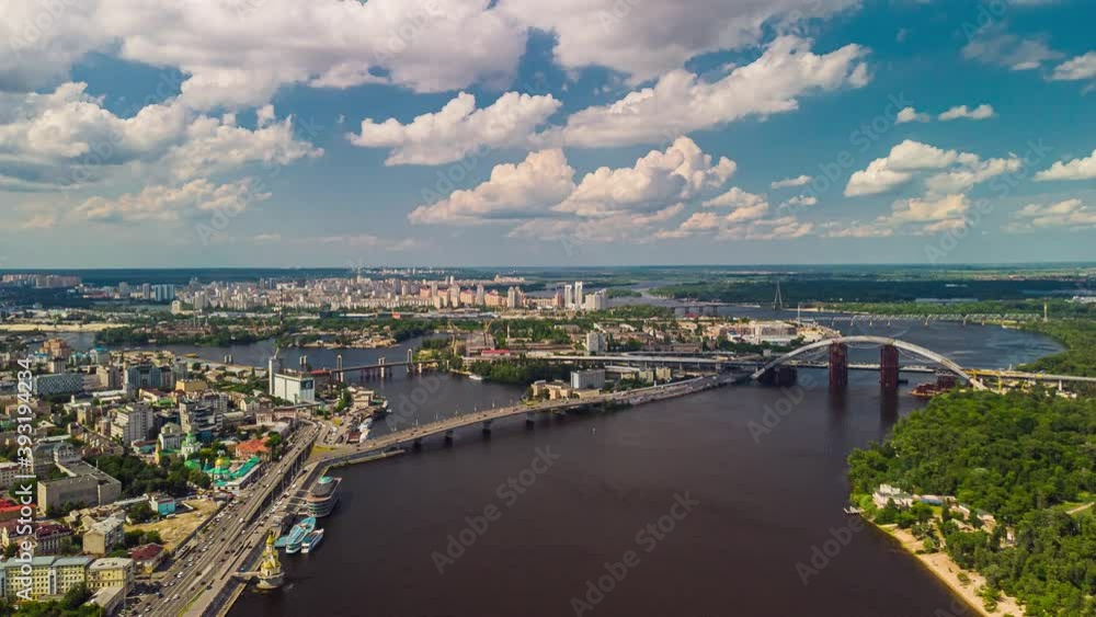 Beautiful summer time-lapse from a quadcopter. Top view of the city of Kiev, the Dnieper River, ships that float on the river. Beautiful summer time-lapse from a quadcopter. Top view of the city of Kiev, the Dnieper River, ships that float on the river.
