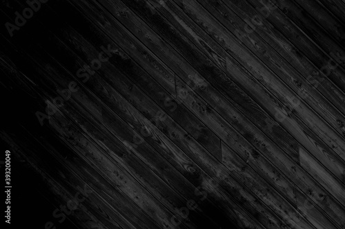 Abstract black background with diagonal wooden board texture. Elegant dark gray grunge nature boards image for elegant style decor, banner, backdrop