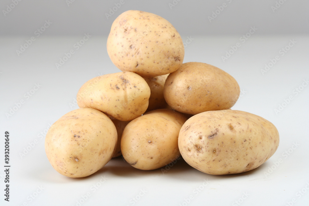 Close up of potatoes on white backround Close up of potatoes on white backround